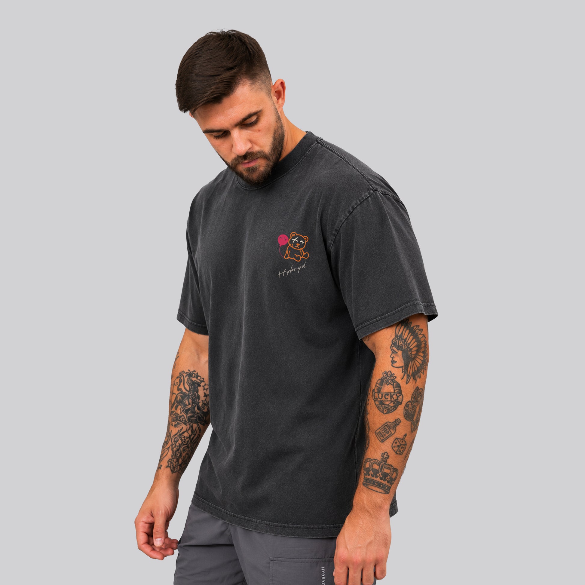 Man Wearing Washed Black Crossfit moto T-shirt_Built For More _Front  Diagonal View - By Hybyrd
