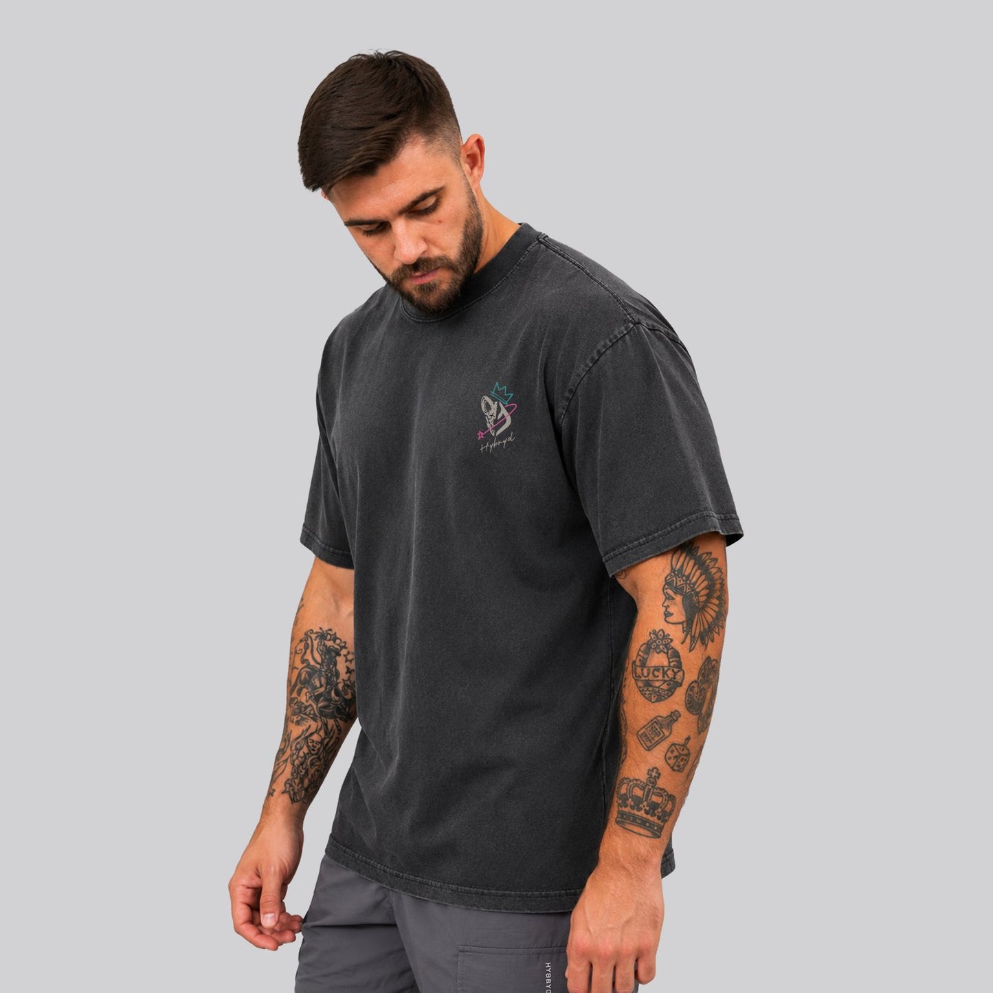 Crossfit athlete wearing Washed black Ethos Tee with small chest print by HYBRYD - Back