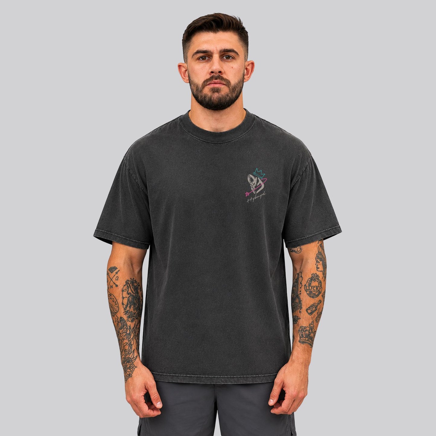 Crossfit athlete wearing Washed black Ethos Tee by HYBRYD - font on