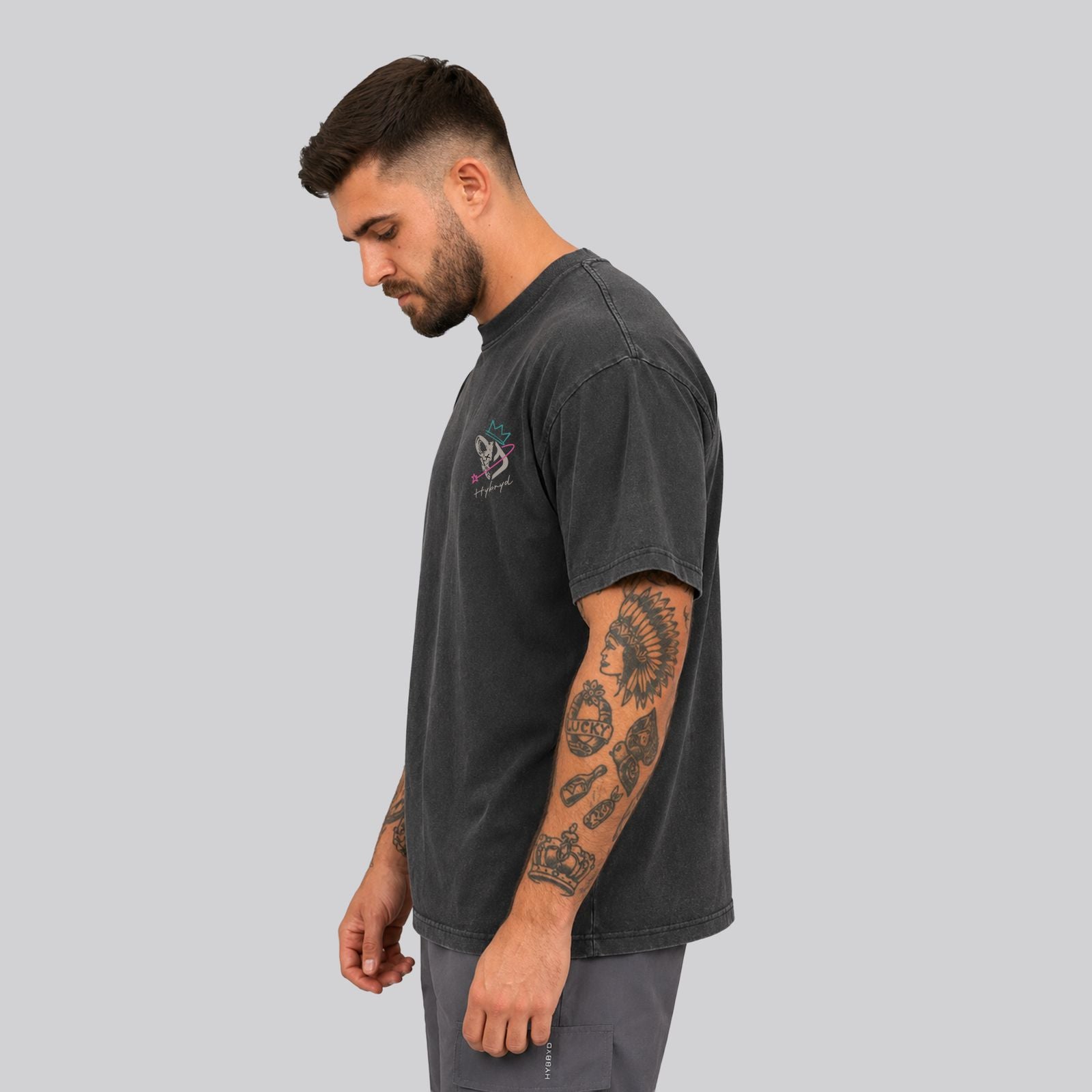 Crossfit athlete wearing Washed black Ethos Tee with small chest print by HYBRYD -side view