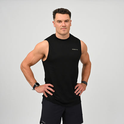 CrossFit male athlete wearing a 100% cotton sleevless black gym tank with back print.  Teamed with Hybryd workout shorts. Made by activewear brand Hybryd.
