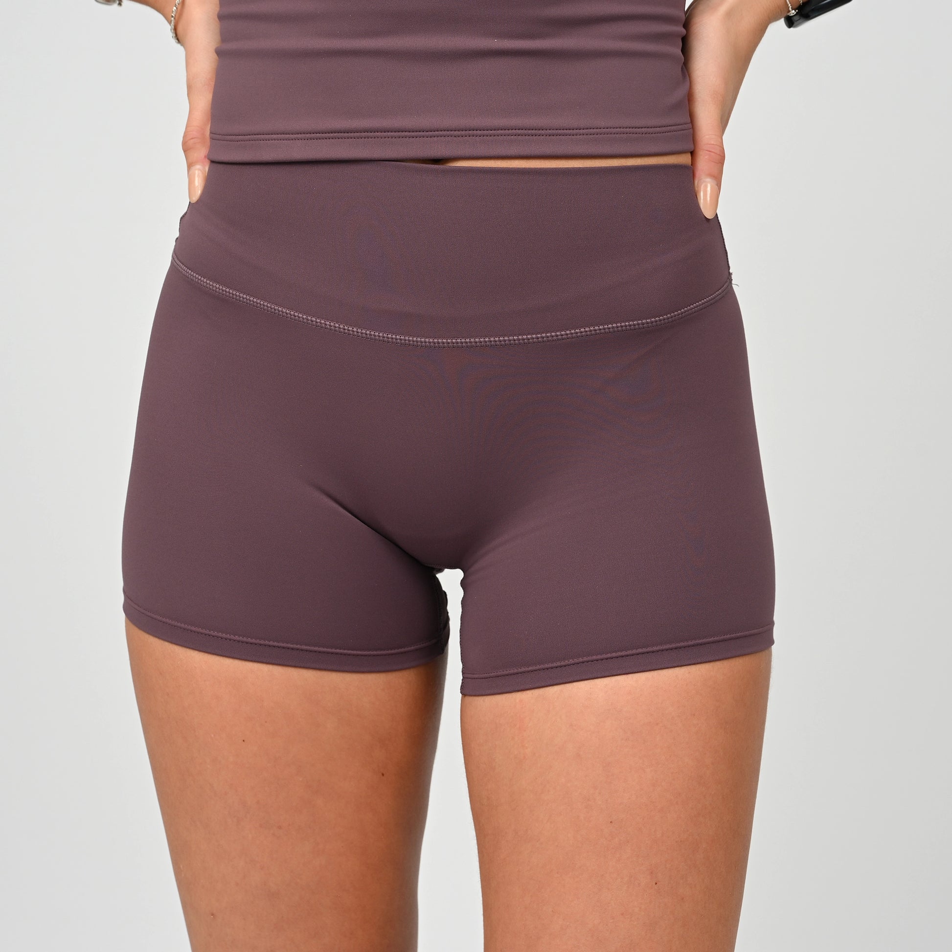 Purple athletic active wear shorts worn by a HYROX athlete from Hybryd activewear.