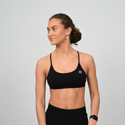 Woman wearing a Hybryd sports bra. 
