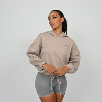 An oversized hoodie from Hybryd worn with grey bootie shorts