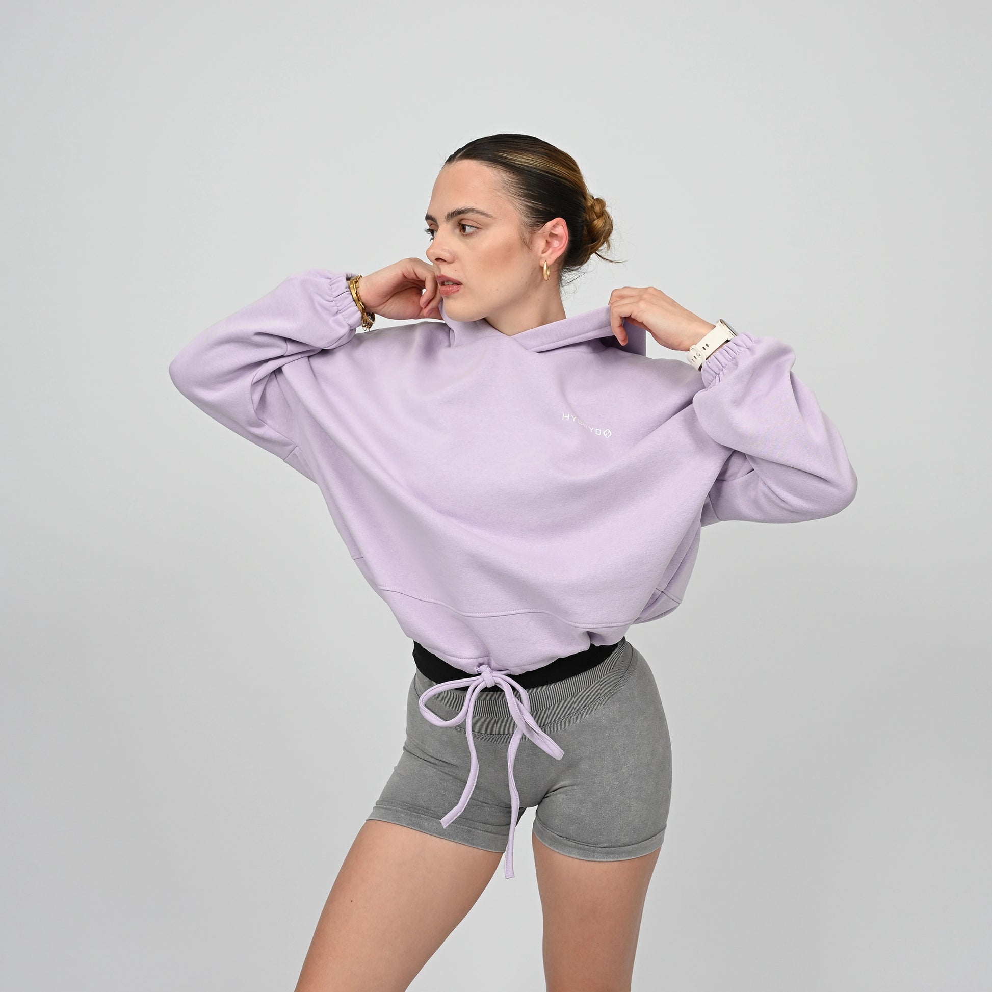 A cropped oversized hoody and grey scrunch bum booty shorts from Hybryd