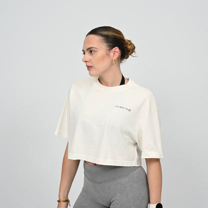 Woman wearing an oversized cropped gym tee from Hybryd
