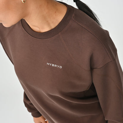 Brown sweatshirt with 'HYBRYD' logo on a plain background