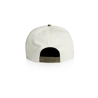 The back view of a unstructured Hybryd baseball cap in off-white, featuring a dark black curved panel at the back and a metallic olive green snap closure.