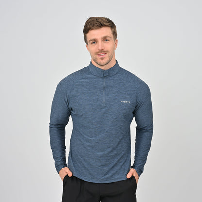Hybryd athlete wearing a blue long-sleeve baselayer