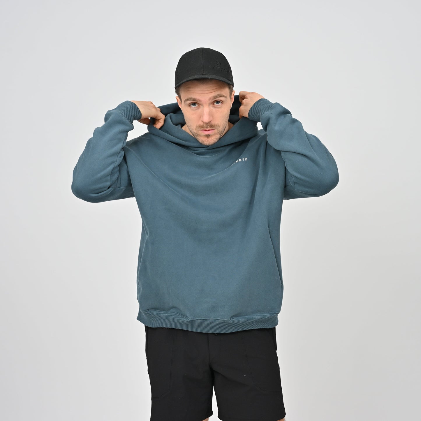 man wearing Teal colour Hybryd hoodie