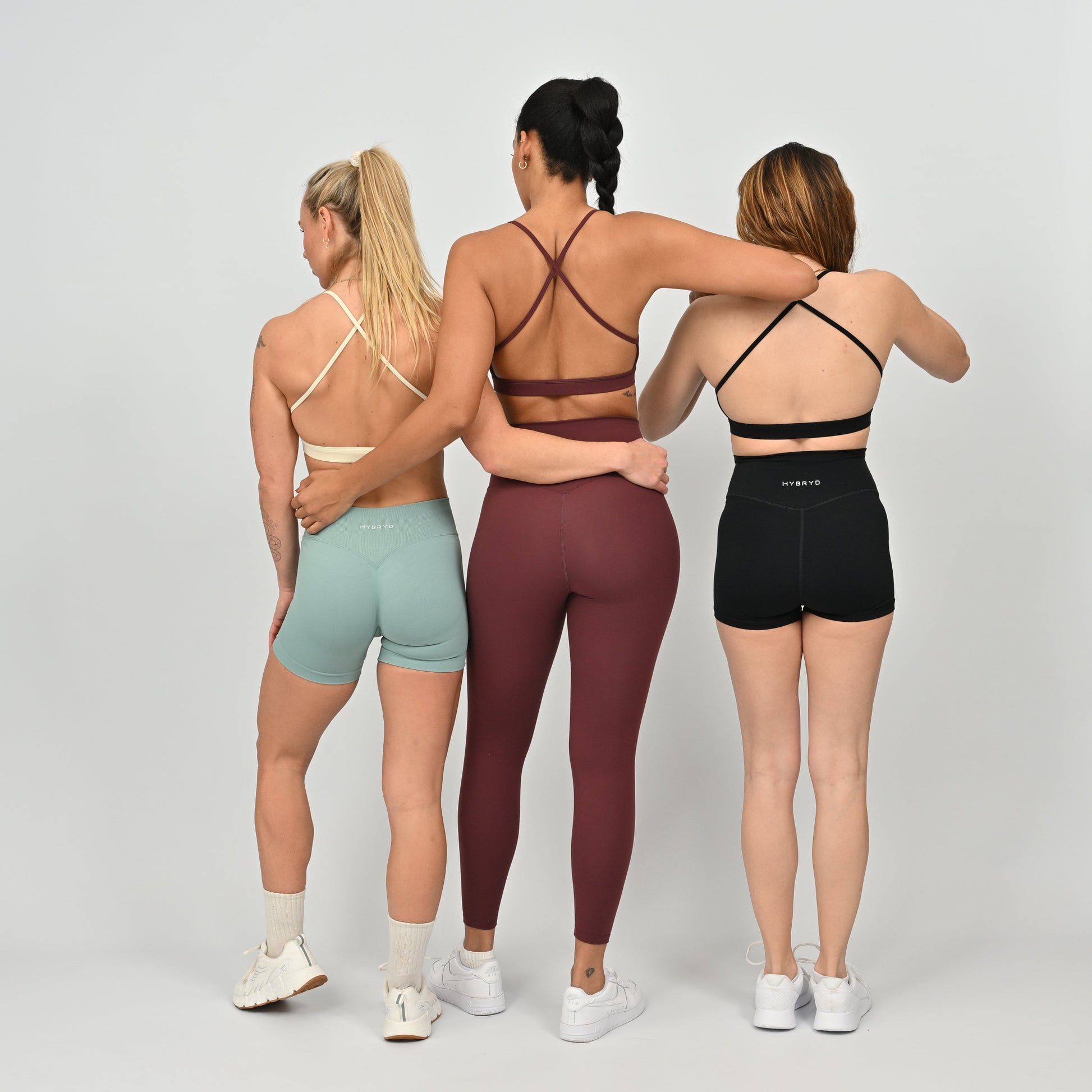 Hybryd athletes wearing minimal sports bras