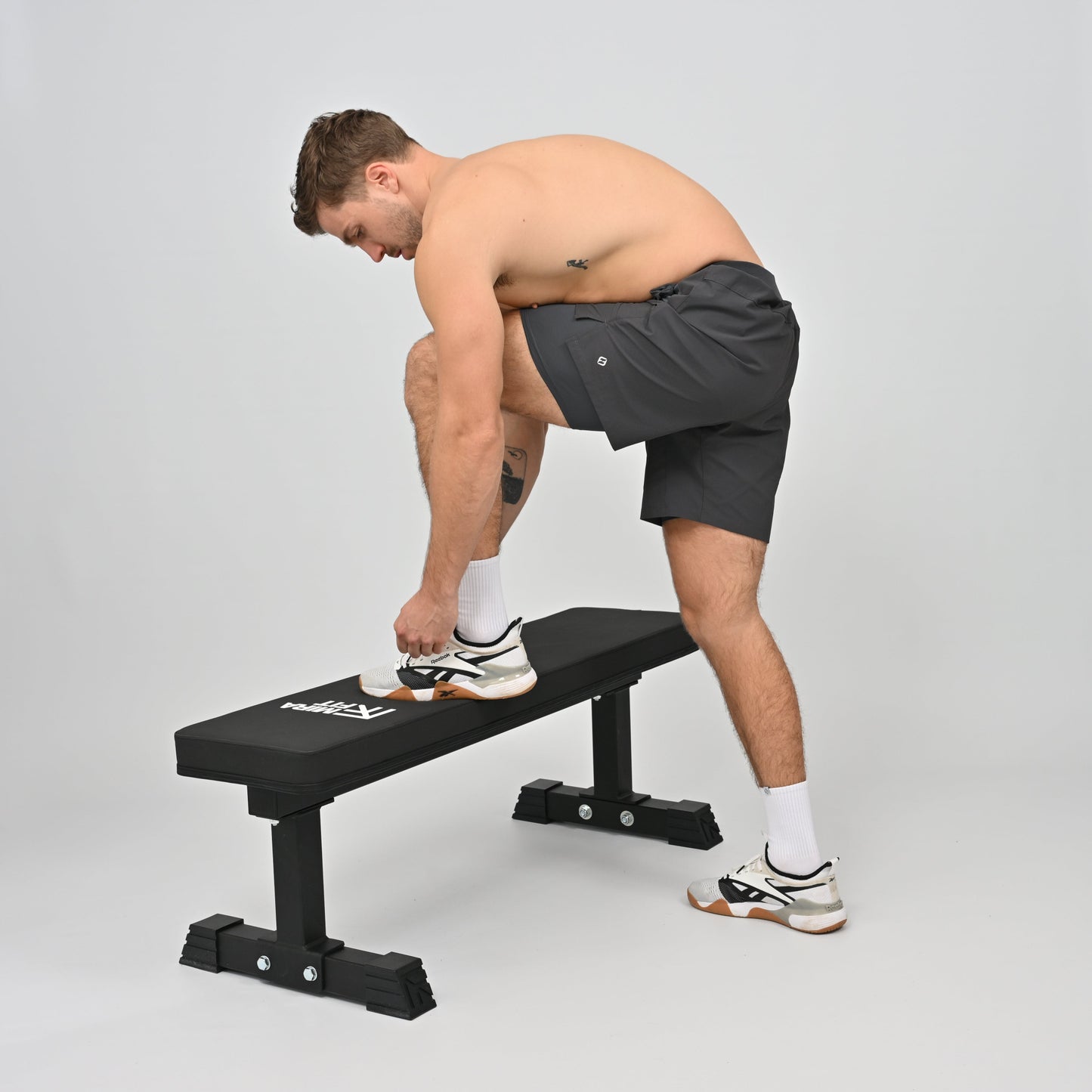 Hybryd athlete in sports shorts with inner