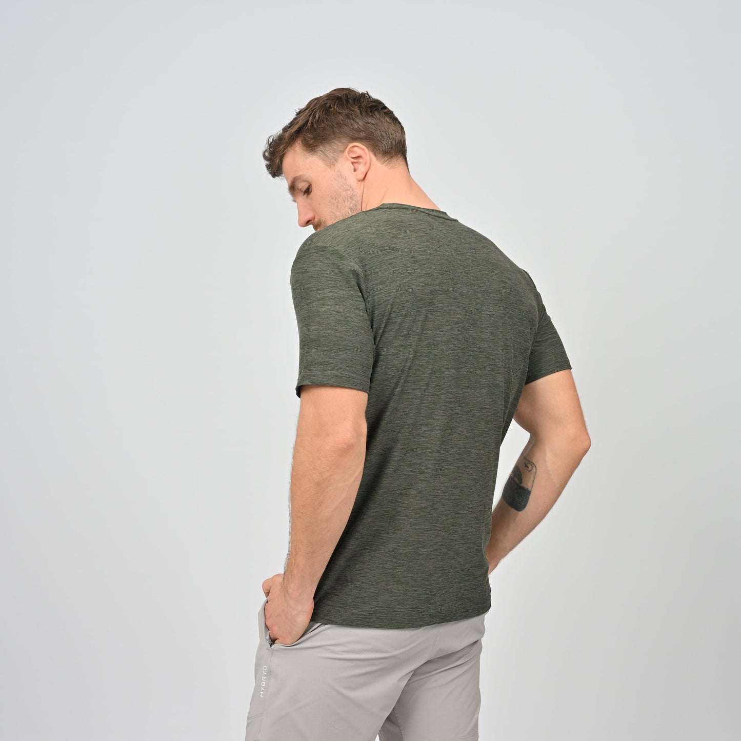 Man wearing a soft feeling green t-shirt 