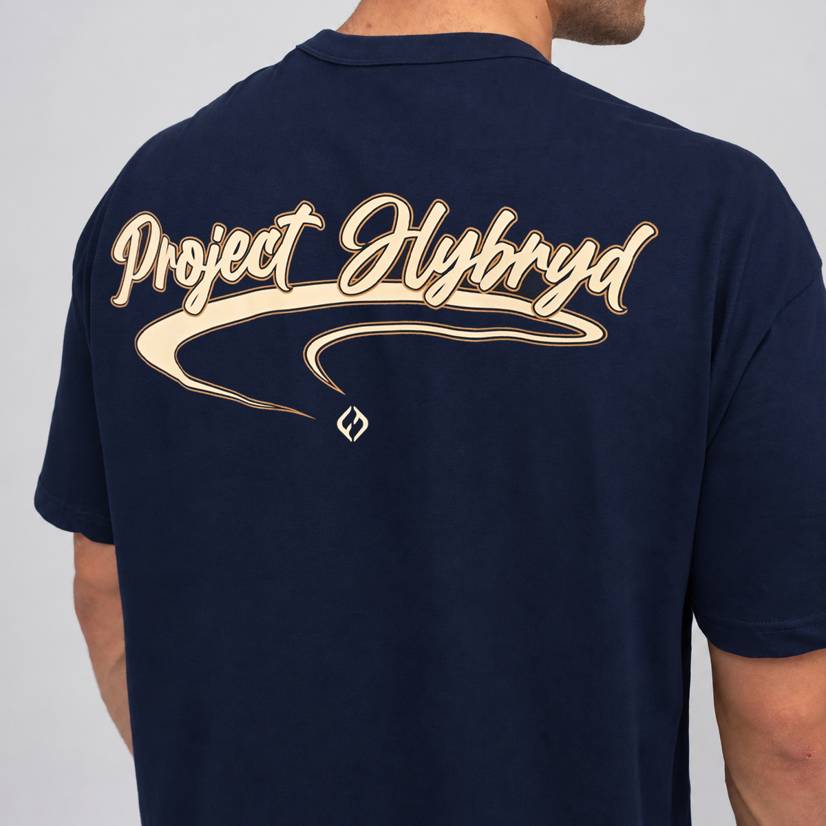 Men’s navy oversized gym T-shirt featuring a large cream Project Hybryd graphic across the back.