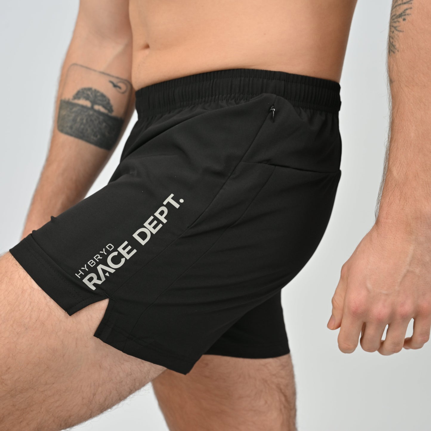 Black athletic shorts with 'HYBRYD RACE DEPT.' branding