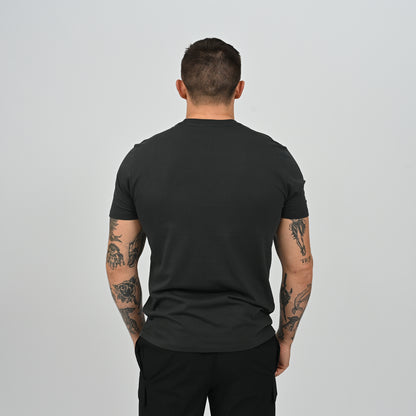 Back view of male model wearing black Hybryd Delta Core workout t-shirt   