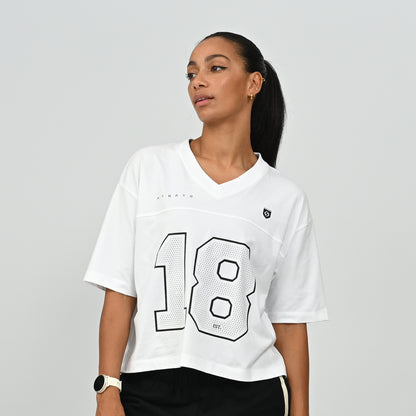 Close-up front view of the white HAFT collegiate American football jersey t-shirt by Hybryd showing the number 18 graphic print