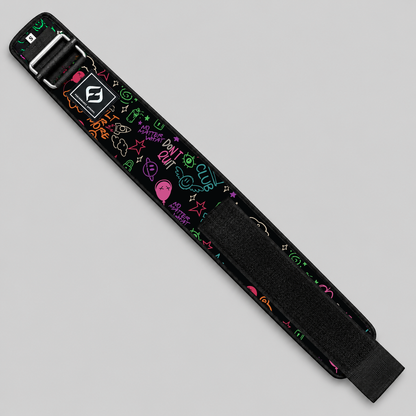 HYBRYD Ethos printed weightlifting belt laid flat at an angle, showing graffiti artwork, Velcro fastening and metal buckle