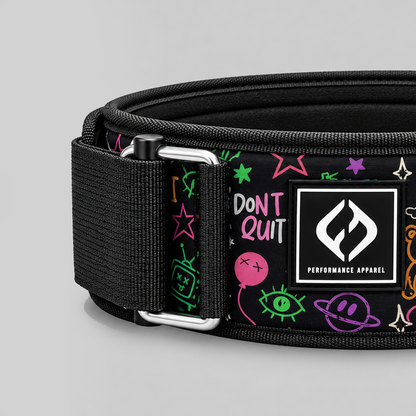 Close-up of HYBRYD Ethos graffiti weightlifting belt showing logo patch, woven fabric texture, reinforced stitching and metal buckle.