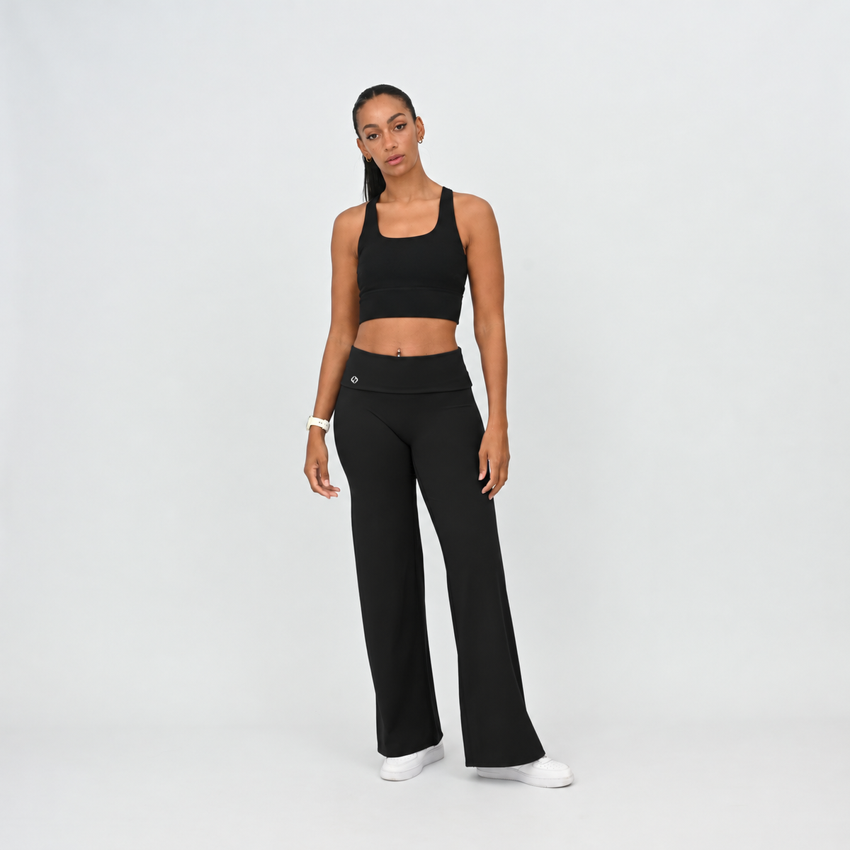 Women’s black Gracie wide leg gym leggings with fold-over waistband, front view