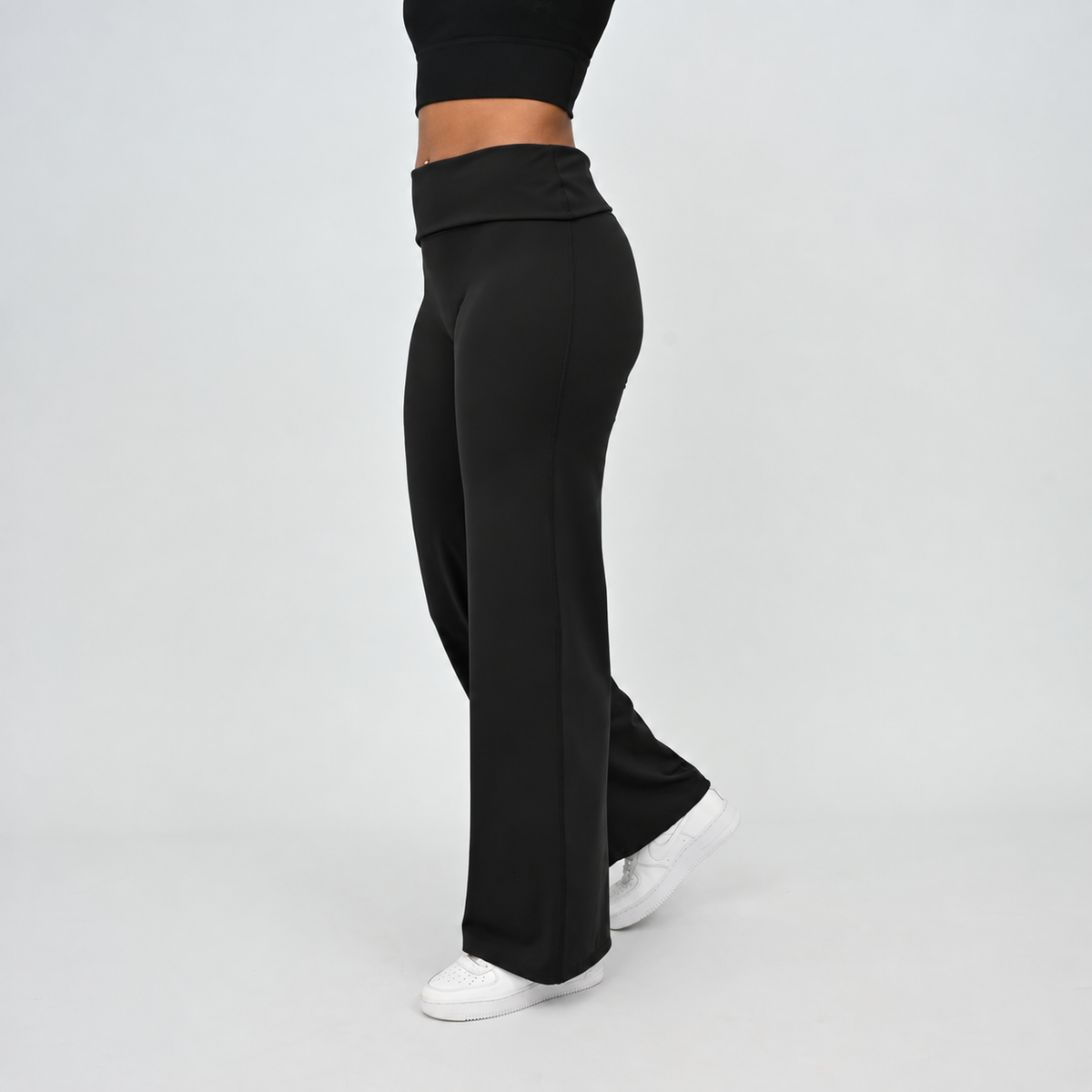 HYBRYD Gracie black wide leg leggings, three-quarter front view