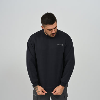 Man wearing the Hybryd Jasper relaxed fit fleece-lined crew neck sweatshirt in navy blue, front view