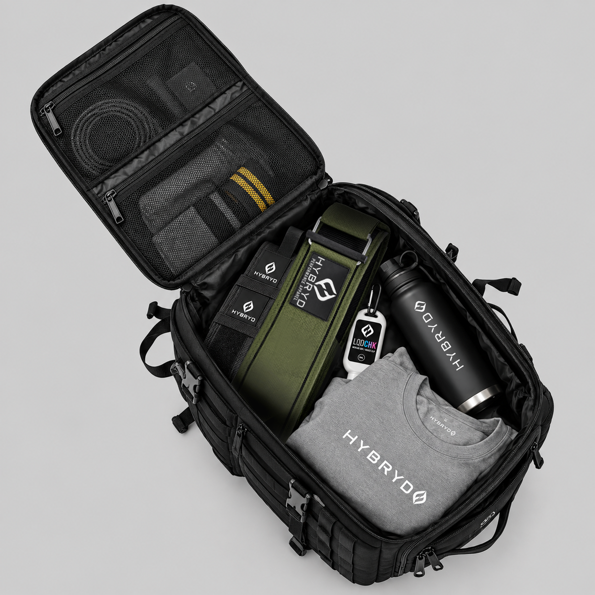 Hybryd 35L tactical gym bag opened flat showing packed CrossFit training gear and kit