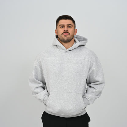 Full front view of male model standing in the grey Hybryd Palmer fleece lined hoodie   