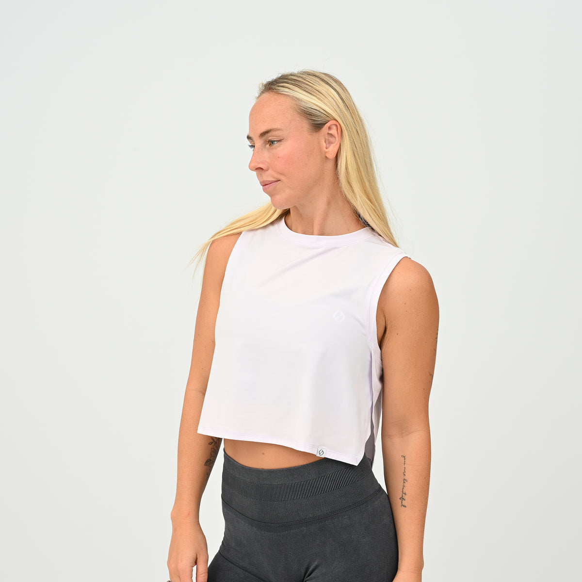 Women’s Ivy Crop Vest in lilac, front view showing the relaxed cropped fit and high neckline