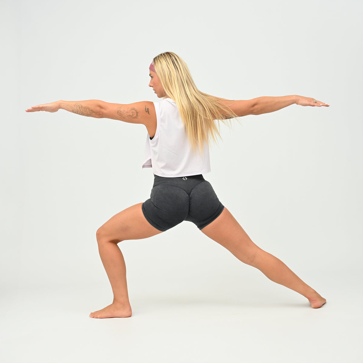 Women’s lilac Ivy Crop Vest worn during gym movement, with a relaxed cropped silhouette.