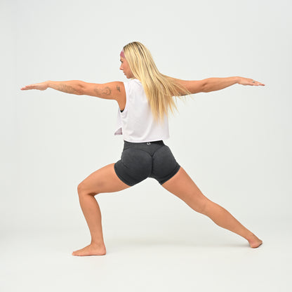 Women’s lilac Ivy Crop Vest worn during gym movement, with a relaxed cropped silhouette.